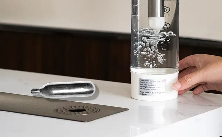 close up of a soda maker with an improperly inserted co2 cartridge